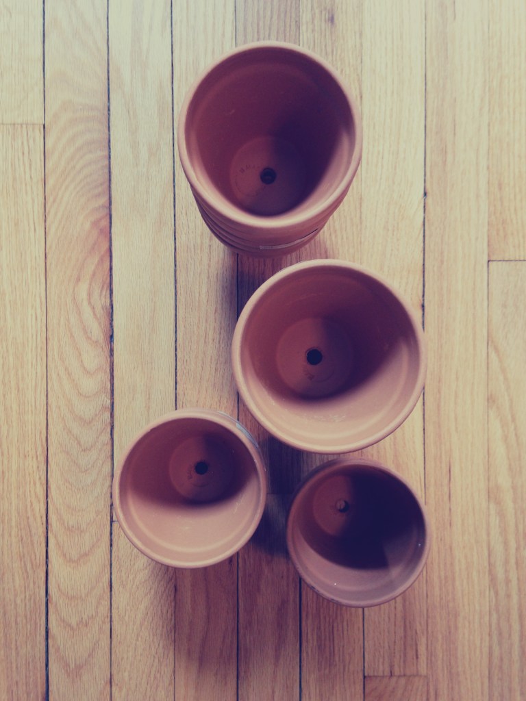 Vertical Pallet Garden Step 4 - Terra-Cotta Pots
